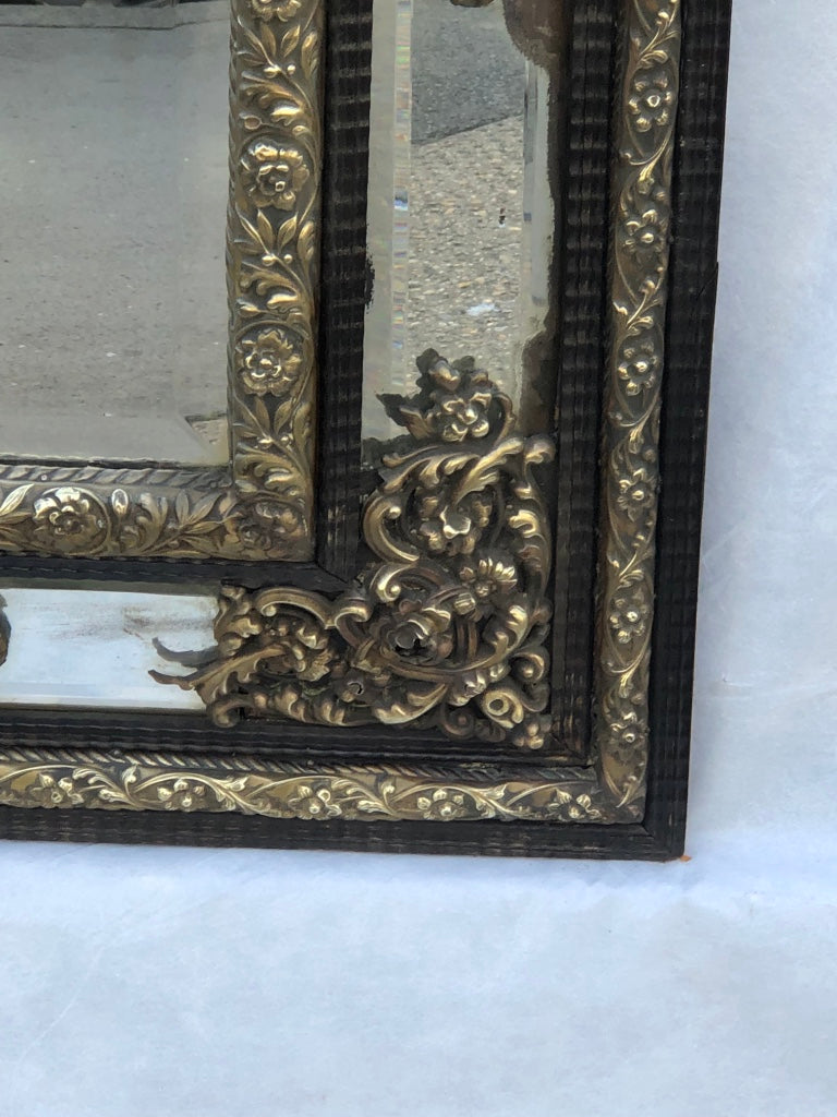 Frencn 19th century repoussé mirror. 128 x 74cm