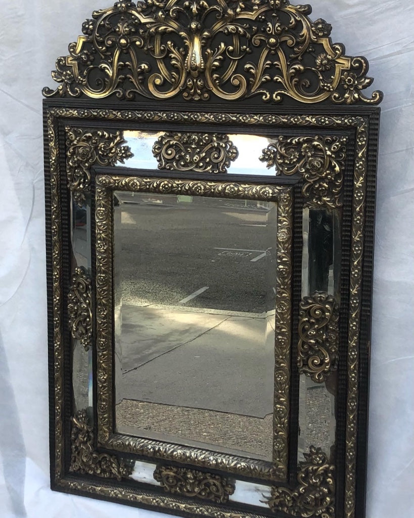 Frencn 19th century repoussé mirror.  128 x 74cm