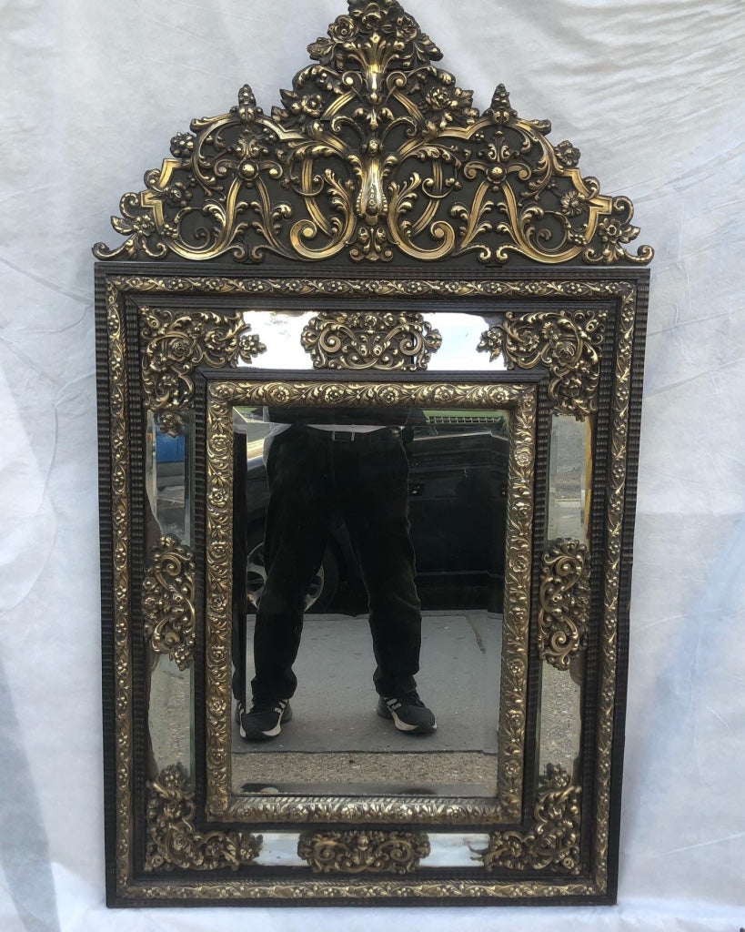 Frencn 19th century repoussé mirror.  128 x 74cm