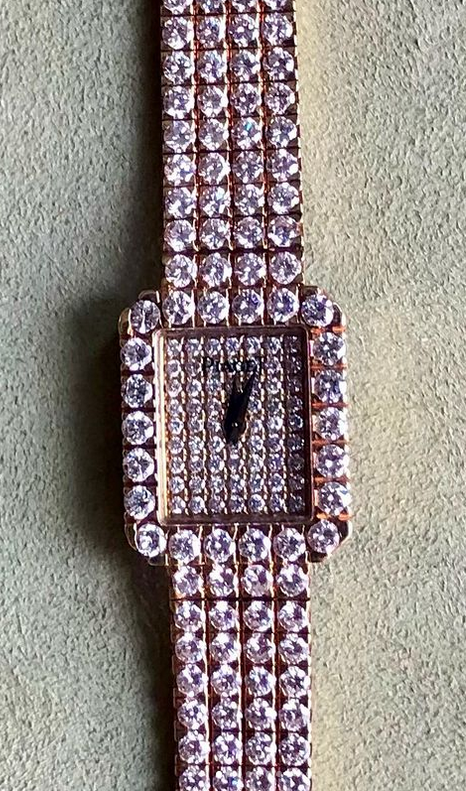 Vintage Piaget Halo Watch. 18 Ct gold,  8cts natural diamonds